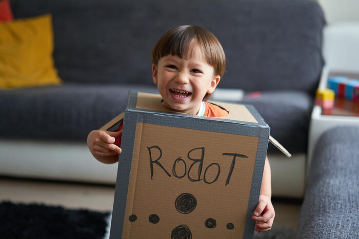 Kid playing in box