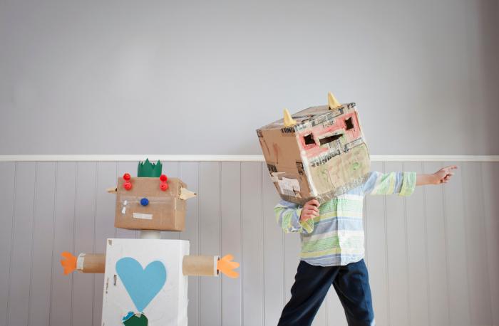 Kids playing with boxes