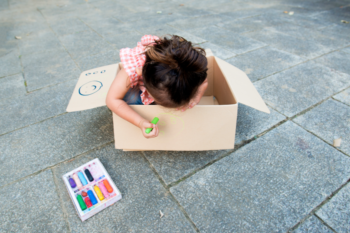 kid drawing on box