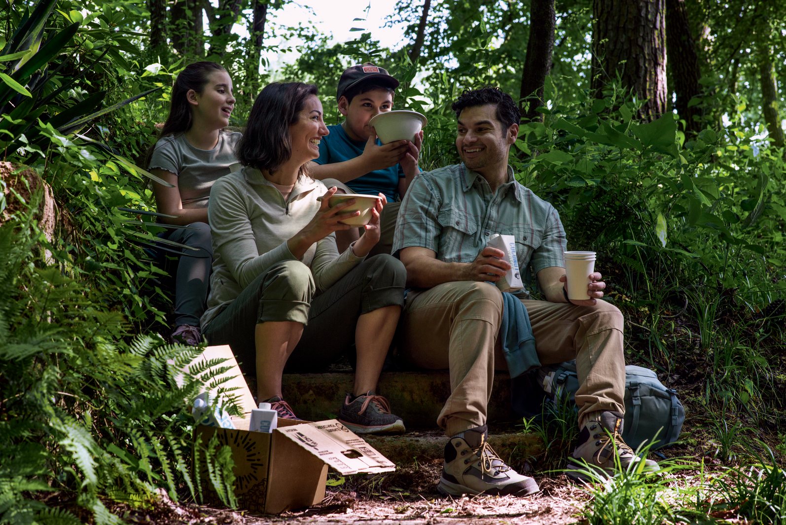 Family picnic in the woods