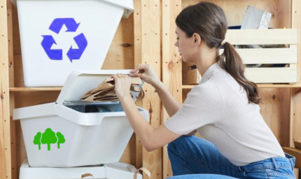 Women sorting her paper recycling 