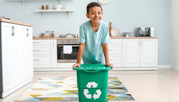 Kid with recycling bin