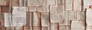 Pile of open printed books