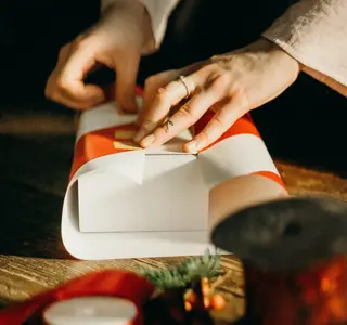 Women wrapping a present