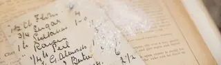 vintage cookbook with handwritten recipe